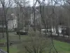 Hameau de la basse Chevrière - Le moulin vert de la Chevrière au travers des arbres