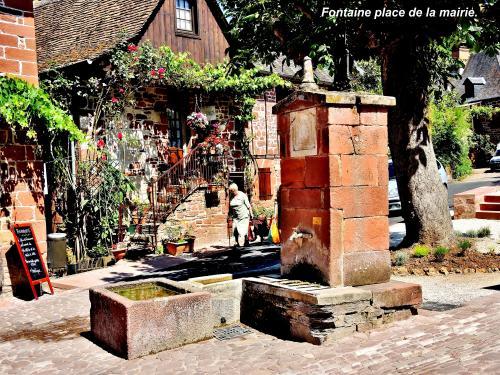 Collonges-la-Rouge - Brunnen am Rathausplatz (© Jean Espirat )
