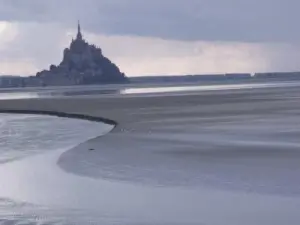 Bay of Mont-Saint-Michel, a tidal bore evening