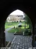 Les Herbiers - Bousseau door of the castle overlooking the gardens Coria