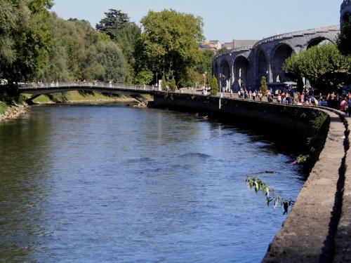Lourdes - Park basilica: the Pau river