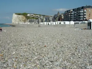 The pebble beach in front of the pretty facades