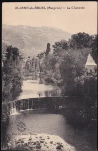 Fisherman watching trout around 1930