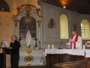 A mass is held in the St. Nicolas church of Attez