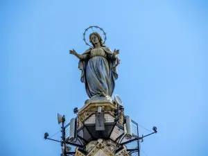 Statue of Our Lady, at the top of the bell tower of the Basilica of Sion (© J.E)