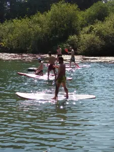 Carrera de Sup Paddle con amigos.