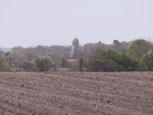 Gouberville - Le clocher de l'église vu de la mer