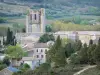 Лаграсс - Вид на аббатство Сент-Мари д'Орбье и его колокольню; в Корбьер