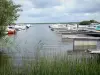 土地の風景 - Sanguinet港のボートとCazauxとSanguinetの池の眺め