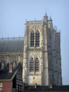 Abbeville - Towers of the Saint-Vulfran collegiate church of Flamboyant Gothic style and roofs of buildings