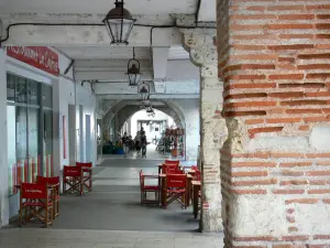 Agen - Under the arcades of the Rue des Cornières street