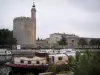 Aigues-Mortes - Constance tower (circular keep), Governor town house, ramparts and moored barges