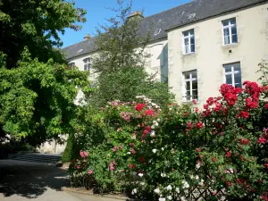 Alençon - Old Jesuit college home to the Museum of Fine Arts and Lace, and blooming rosebushes