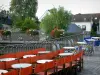 Amiens - Saint-Leu district: cafe terraces, rail decorated with flowers, trees and houses