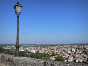 Angoulême - Ramparts of the upper town, view of the houses and buildings of the low city (Charente valley), lamppost in foreground