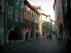 Annecy - Arcaded houses and colourful facades, café terrace and shops of the Sainte-Claire street