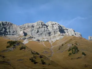 Aravis massif - From the Col des Aravis pass, view of alpine pastures (high meadows) and rock faces (cliffs) of the Aravis mountain range