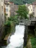 Arbois - Cuisance rivier, de stad huizen en bomen