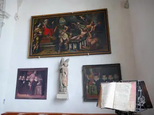 Arnay-le-Duc - Inside the Saint-Laurent church: statue of Saint Michael and paintings