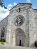 Auvillar - Portal and rose window of Saint-Pierre church (former Benedictine priory) 