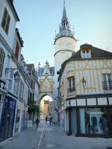 Auxerre - Gate and clock tower, half-timbered house and shops in the old town