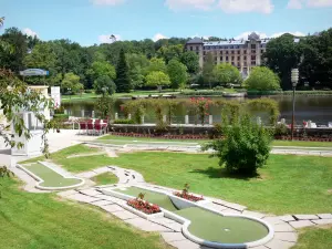 Bagnoles-de-l'Orne - Spa town: mini-golf on the lake, and residence of the Lake (formerly Grand Hotel) in background