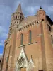 Beaumont-de-Lomagne - Toulouse-style facade and bell tower of the Notre-Dame-de-l'Assomption church of Southern European Gothic-style 