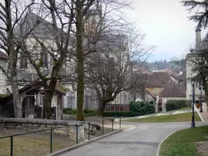 Belley - Alley in the park of the episcopal palace overlooking the trees and the head of the Saint-Jean-Baptiste cathedral