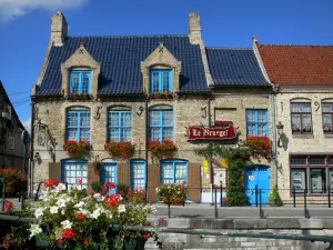 Bergues - Facade of a Flemish tavern, flowers in foreground