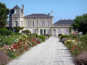 Bordeaux vineyards - Château Chasse-Spleen and its flower garden, winery in Moulis-en-Médoc 