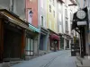 Briançon - Upper town (Vauban citadel, fortified town built by Vauban): Grande Rue high street (Grande Gargouille) with its central channel, its houses with colourful facades and its shops