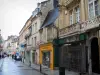 Caen - Houses and shops in a street of the city