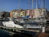 Le Cap-d'Agde - Boats and sailboats of the sailing port, and buildings of the seaside resort