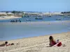 Le Cap-Ferret - Vacationers sitting on one of the sandy beaches of the sea resort 