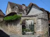 Carennac - Maisons et portail d'un jardin