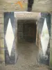 Catacombs of Paris - Entrance to the boneyard topped with the inscription 