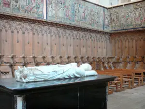 La Chaise-Dieu Abbey - Inside the Saint-Robert abbey church: tomb of Pope Clement VI, stalls and tapestries in the choir
