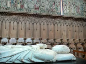 La Chaise-Dieu Abbey - Inside the Saint-Robert abbey church: tomb of Pope Clement VI, stalls and tapestries in the choir