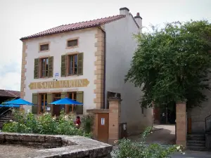 Chapaize - House, restaurant terrace, rosebushes in foreground