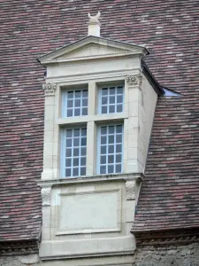 Chareil-Cintrat castle - Attic window of the main building