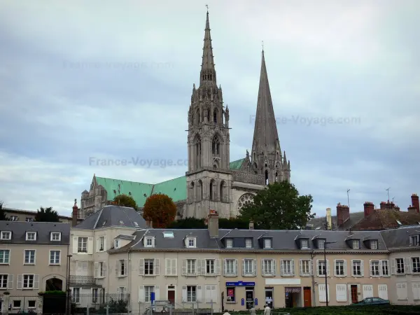 Chartres - Notre-Dame cathedral of Gothic style (western facade) and buildings of the city