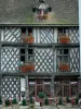 Chartres - Saumon house and its timber-framed facade, its geranium-bedecked windows (flowers) and its café terrace