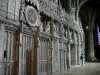 Chartres - Inside of the Notre-Dame cathedral (Gothic building): fence of the chancel (tower) with its astronomical clock and its statues (statuary)