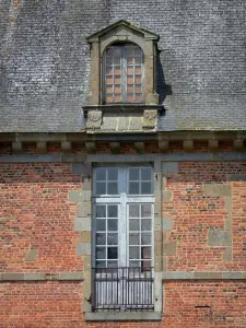 Château de Carrouges - Details of the château: window, skylight, brick and stone facade, slate roof