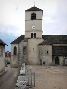 Château-Chalon - Saint-Pierre romanesque church with its bell tower, wicket, street and houses