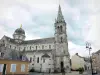 Châteauroux - Notre-Dame church of Neo-Romanesque style, lamppost and houses of the old town