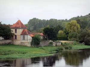 Chauvigny - Houses and trees by the River Vienne