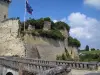 Chinon - Bridge leading to the castle and clouds in the blue sky