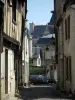 Chinon - Narrow paved street lined with houses