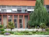 Choisy park - Facade of the George Eastman foundation and flowerbeds in the park